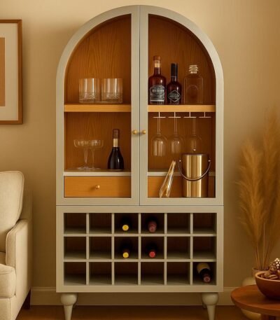 "Elegant arched bar cabinet made of sheesham wood, includes a bottle rack, glass holders, and ample storage space