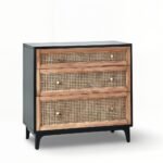 Modern three-drawer dresser with cane front and black wood finish, perfect for minimalist interiors.