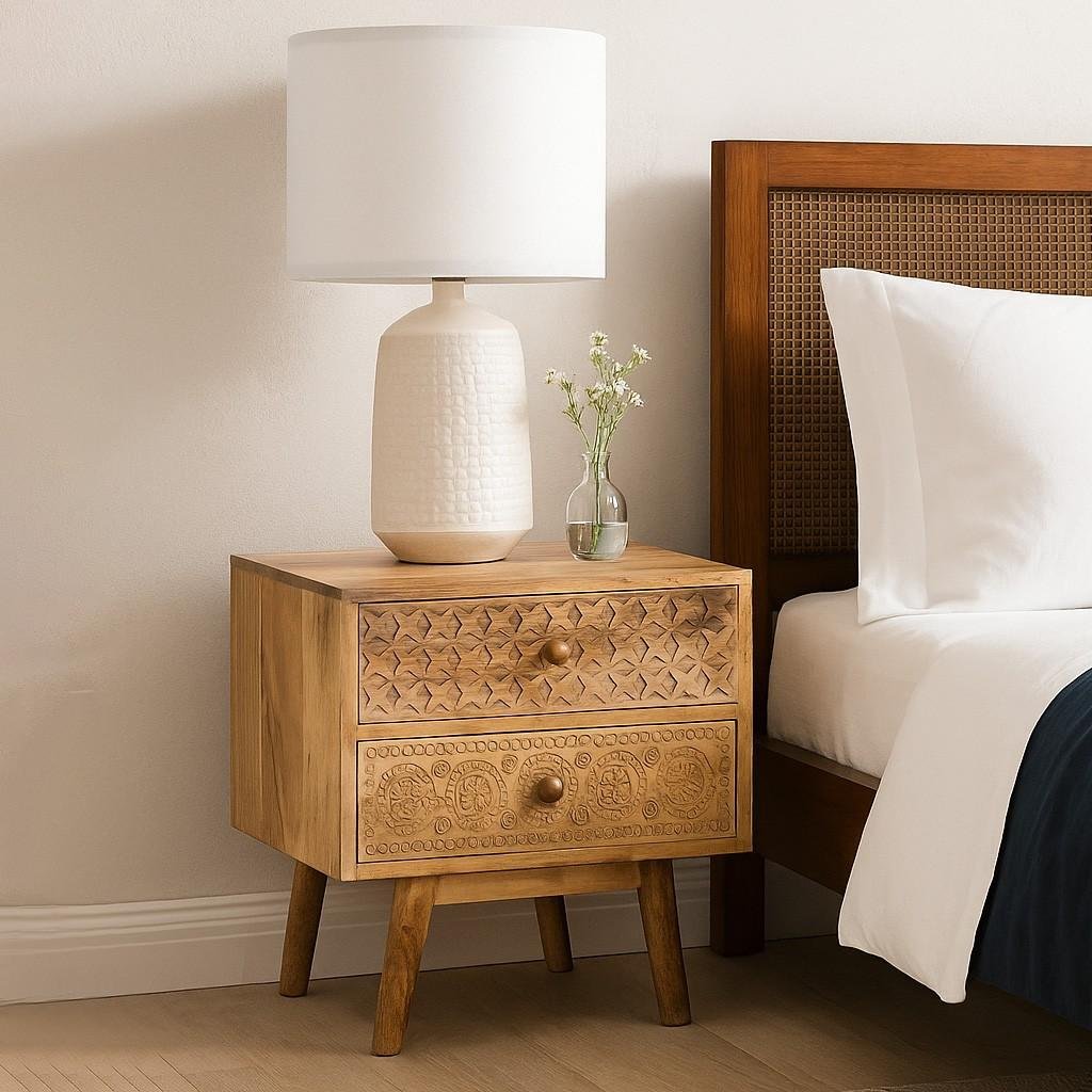 Handcrafted sheesham wood bedside table with hand-carved floral drawers and natural wood finish
