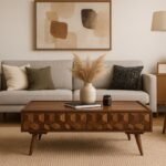 Modern wooden coffee table with geometric drawer design and tapered legs.