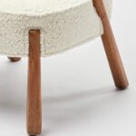 Armetta handcrafted sheesham wood boucle lounge chair with curved arms and cushioned seat