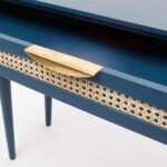 Rattan study table in Sheesham wood with deep blue finish and cane drawers