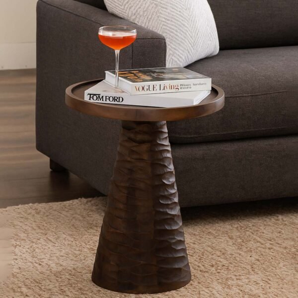 Dark wooden end and side table with a round top and hand-carved conical base in natural Sheesham wood.