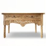Handcrafted Sheesham wood console table with floral carvings and spiral legs in a natural light finish.