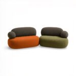 Modular bouclé sofa with two-tone upholstered pods and Mango wood frame