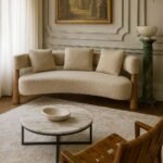 Modern 3 seater sofa in Sheesham wood with curved bouclé upholstery