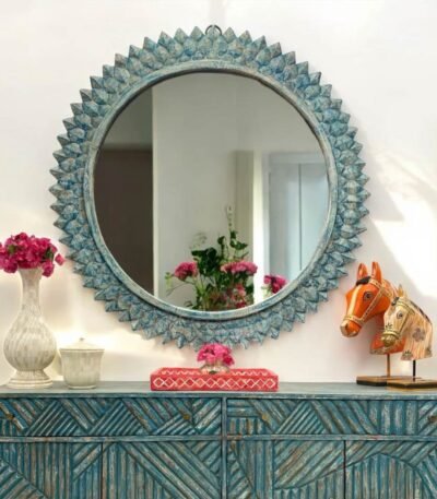 Veloura round mango wood mirror with sunburst carving
