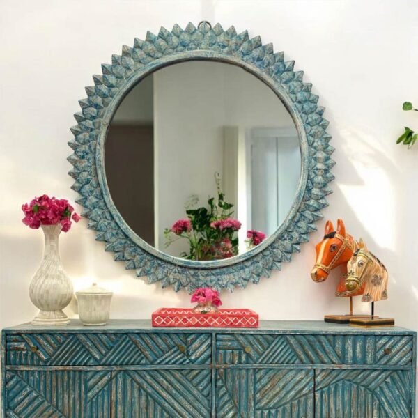 Veloura round mango wood mirror with sunburst carving