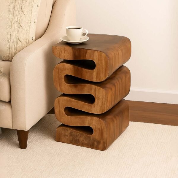 Sculptural wooden end table with modern wavy design and natural Sheesham wood finish.