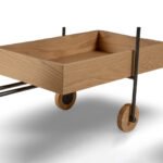 Solid wood bar trolley handcrafted from Sheesham wood with cane wheels and metal frame