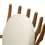 Handcrafted solid wood lounge chair with artistic backrest and circular cushioned seat in cream upholstery – luxury designer accent chair