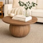 Aurea Round Sheesham Wood Coffee Table with sculptural pedestal base
