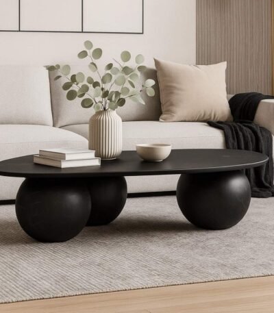 Modern black coffee table with unique sculptural sphere base