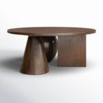 Round wooden coffee table with sculptural cone and sphere base