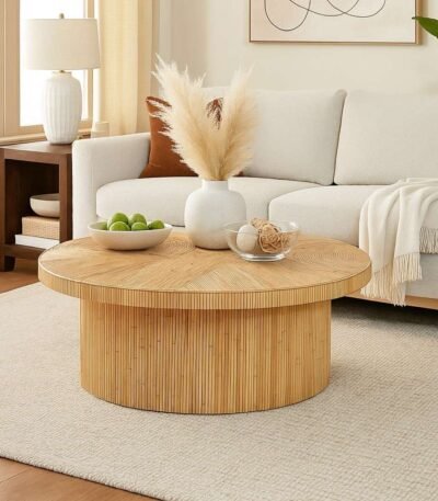 Handcrafted round Sheesham wood coffee table with natural finish