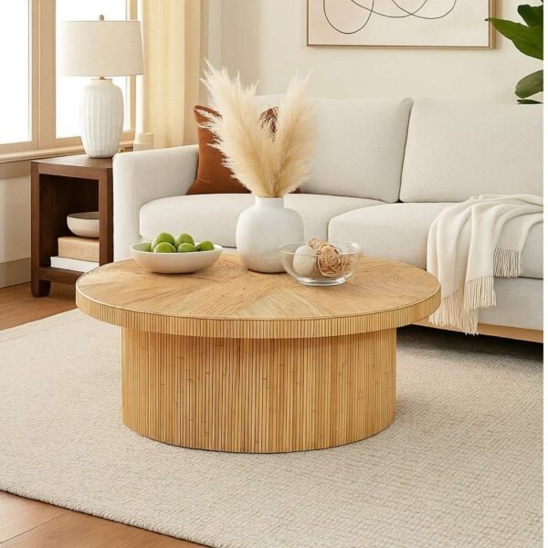 Handcrafted round Sheesham wood coffee table with natural finish