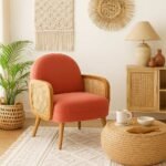 Handcrafted solid wood rattan armchair with coral cushioned seat