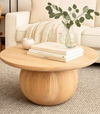 Aurea Round Sheesham Wood Coffee Table with sculptural pedestal base