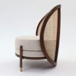 Dome Cane Lounge Chair with curved wooden dome back and natural cane weave