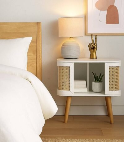 Solid Sheesham wood bedside table with natural cane panels and open storage