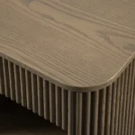 Fluto handcrafted mango wood bedside table with fluted texture and open shelf storage