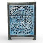 Solid wood handcarved bedside table crafted from mango wood featuring floral carving and distressed blue finish