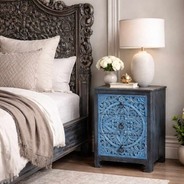 Solid wood handcarved bedside table crafted from mango wood featuring floral carving and distressed blue finish