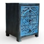 Solid wood handcarved bedside table crafted from mango wood featuring floral carving and distressed blue finish