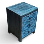 Solid wood handcarved bedside table crafted from mango wood featuring floral carving and distressed blue finish