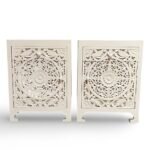 Carved bedside table handcrafted from solid mango wood with floral detailing and white polished finish