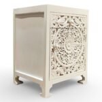 Carved bedside table handcrafted from solid mango wood with floral detailing and white polished finish