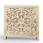 Handcarved nightstant made from solid mango wood featuring detailed floral carving and natural finish