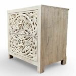 Handcarved nightstant made from solid mango wood featuring detailed floral carving and natural finish