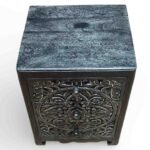 Wooden decorative nightstand crafted from solid mango wood featuring intricate floral carving and dark finish