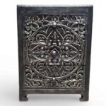 Wooden decorative nightstand crafted from solid mango wood featuring intricate floral carving and dark finish