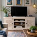 Elegant handcrafted mango wood TV cabinet in white distressed finish with rustic carved detailing.