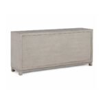 Hand carved TV unit in distressed beige finish crafted from solid mango wood with floral carved cabinet doors and storage drawers.