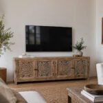 Ravello carved wooden TV unit in solid mango wood with handcrafted detailing and rustic natural finish.