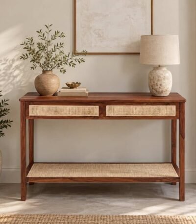 Sheesham Wood Console Table with 2 rattan drawers and woven lower shelf in brown finish.