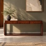 Solid Wood Console Table with 3 drawers, rounded rectangular frame and open lower shelf in walnut brown finish.