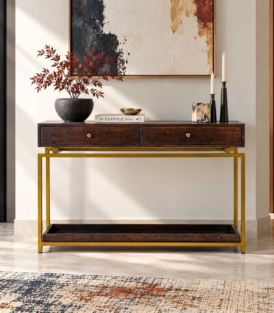 Sheesham Wood Console Table with two walnut brown drawers, gold powder-coated iron legs and open lower shelf.