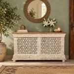 Hand Carved Mango Wood Console Cabinet with Rajasthani jali panels, floral detailing and natural wooden top in antique white finish.