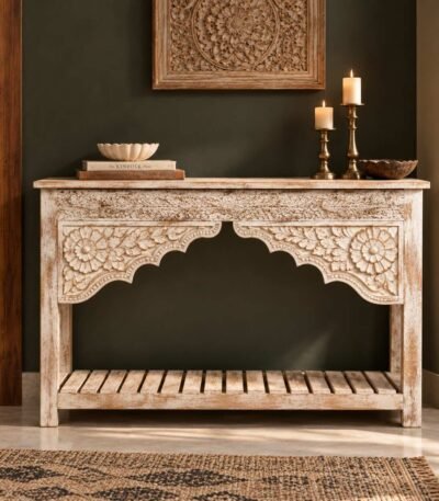Hand Carved Mango Wood Console Table with Rajasthani floral arch detailing, slatted lower shelf and distressed natural wood finish.