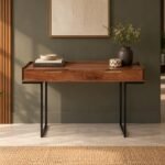 Sheesham Wood Study Desk with two wooden drawers, brass-finish handles and black iron trestle legs in honey brown finish.