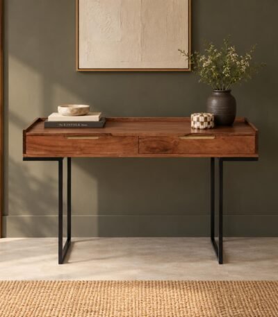 Sheesham Wood Study Desk with two wooden drawers, brass-finish handles and black iron trestle legs in honey brown finish.