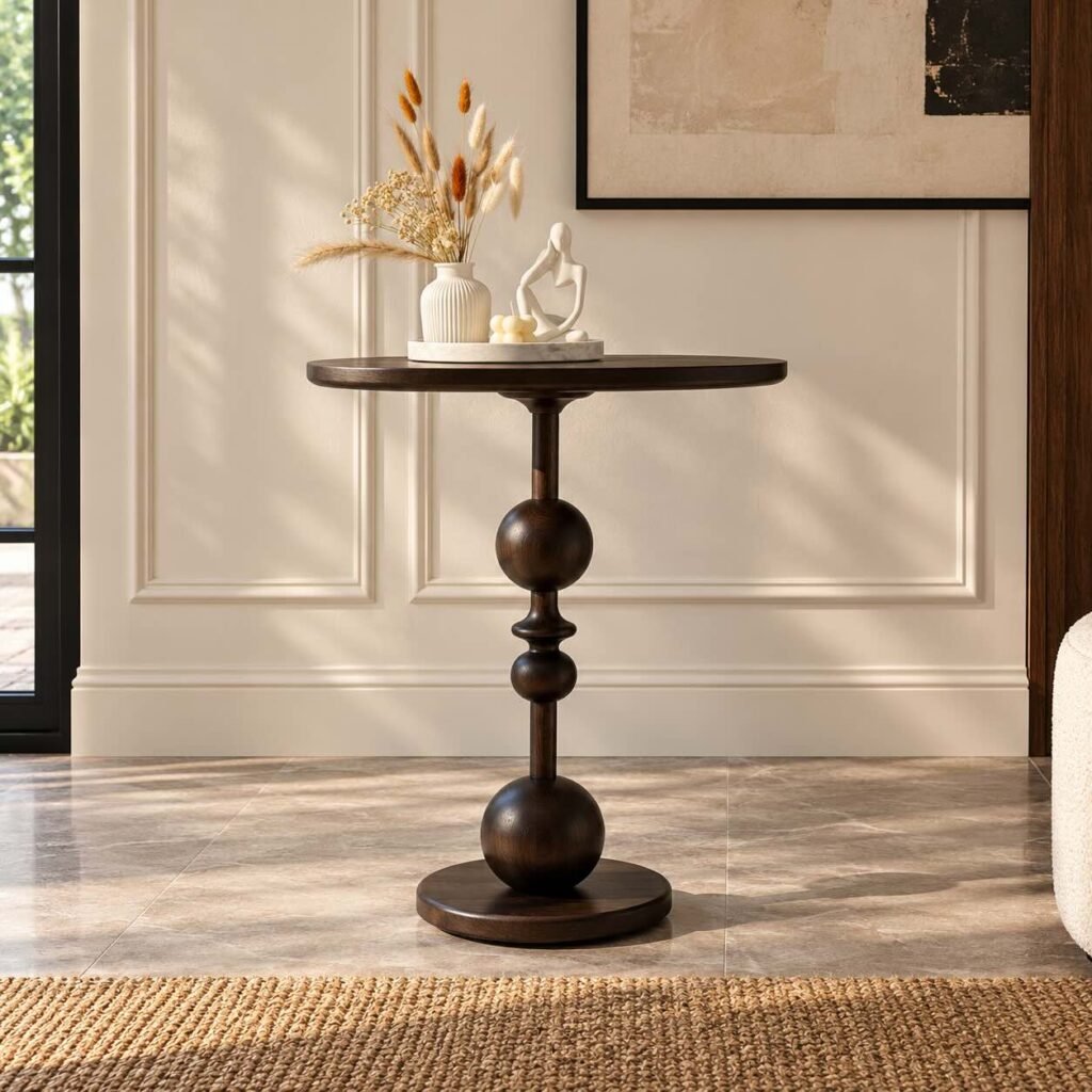 Solid Wood Accent Table with round tabletop, sculptural stacked sphere pedestal and circular wooden base.