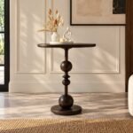 Solid Wood Accent Table with round tabletop, sculptural stacked sphere pedestal and circular wooden base.