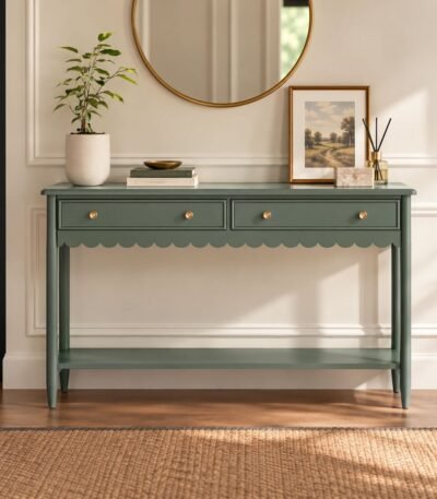 Olive Green Console Table with two storage drawers, scalloped apron, gold-toned knobs and open wooden lower shelf.