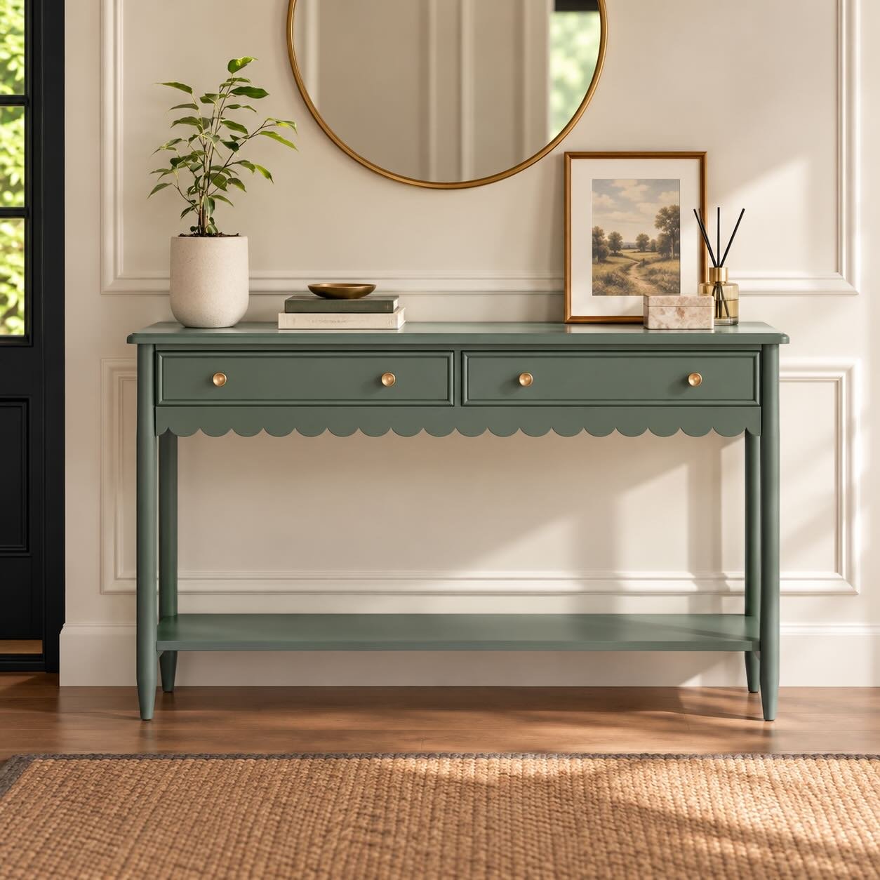 Sylmora Olive Green Solid Wood Console Table with Two Drawers and Lower Shelf Olive Green Console Table with two storage drawers, scalloped apron, gold-toned knobs and open wooden lower shelf.