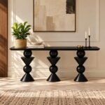 Sculptural Wood Console Table with three geometric sphere-and-cone pedestals and rounded rectangular top in charcoal black finish.